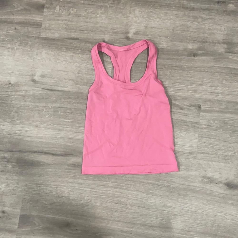 Pink Lululemon race length tank top